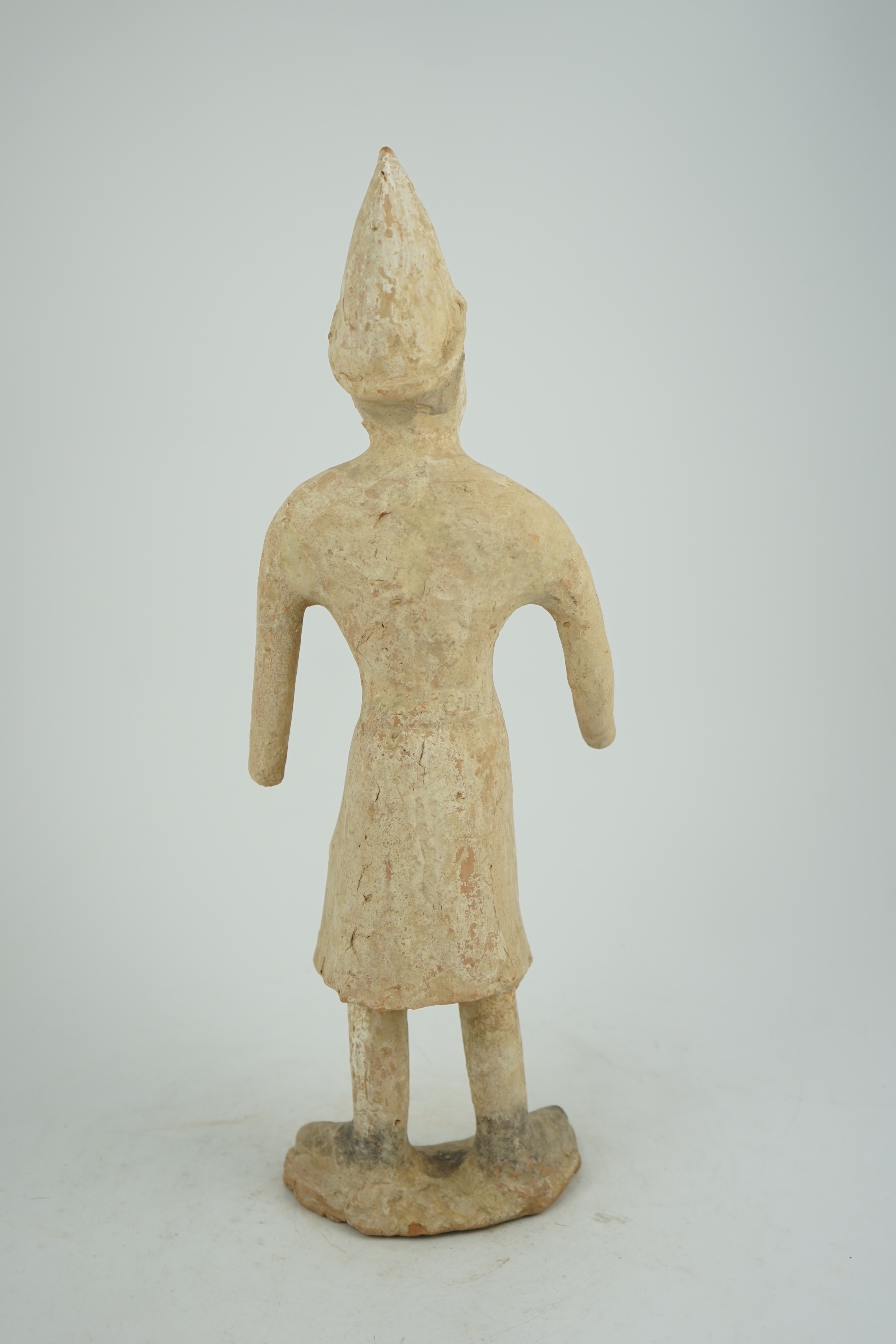 A tall Chinese painted pottery foreigner figure, Tang Dynasty (AD 618-906)